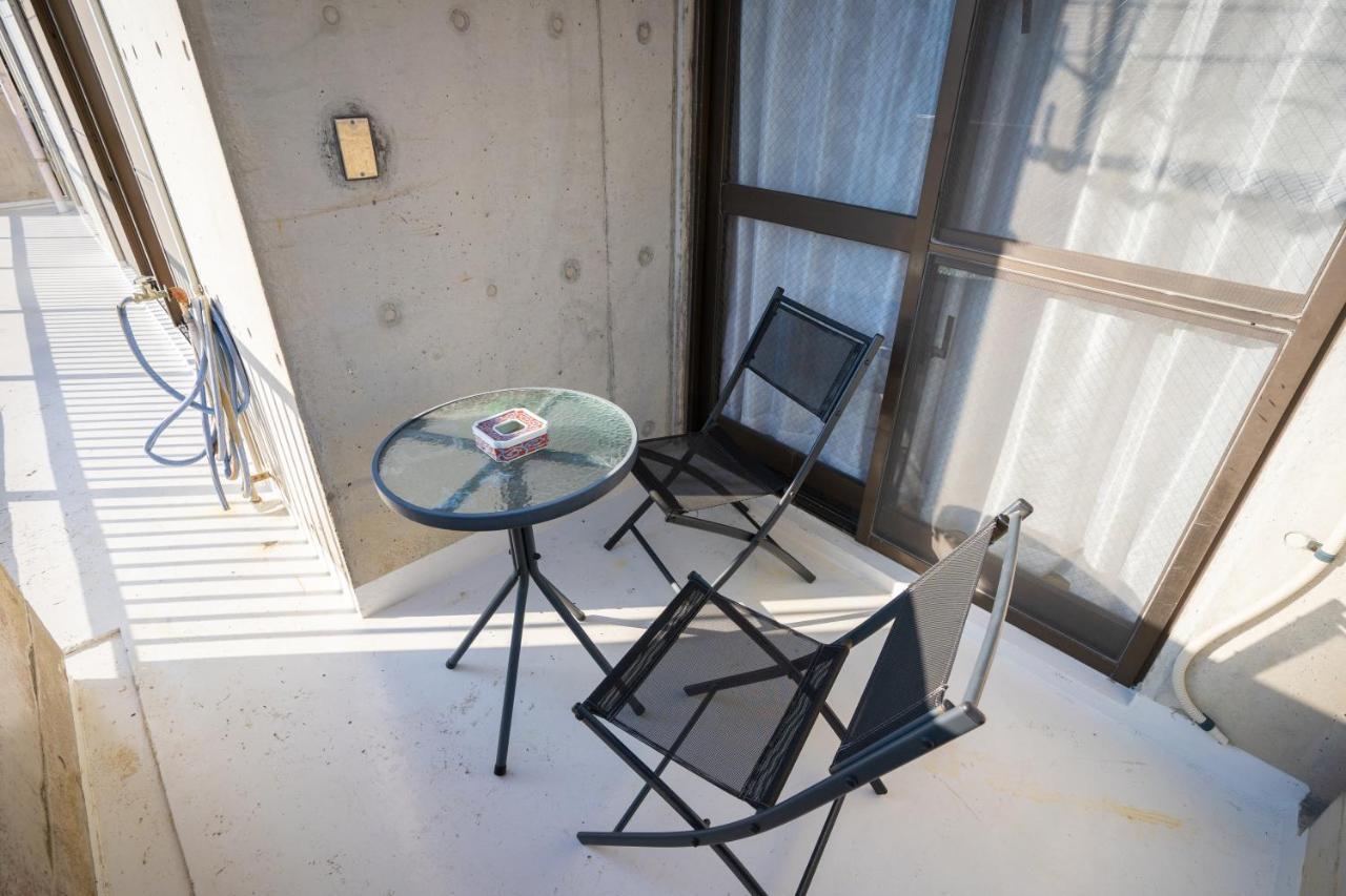 スマイルハイツ Apartamento Naha Exterior foto