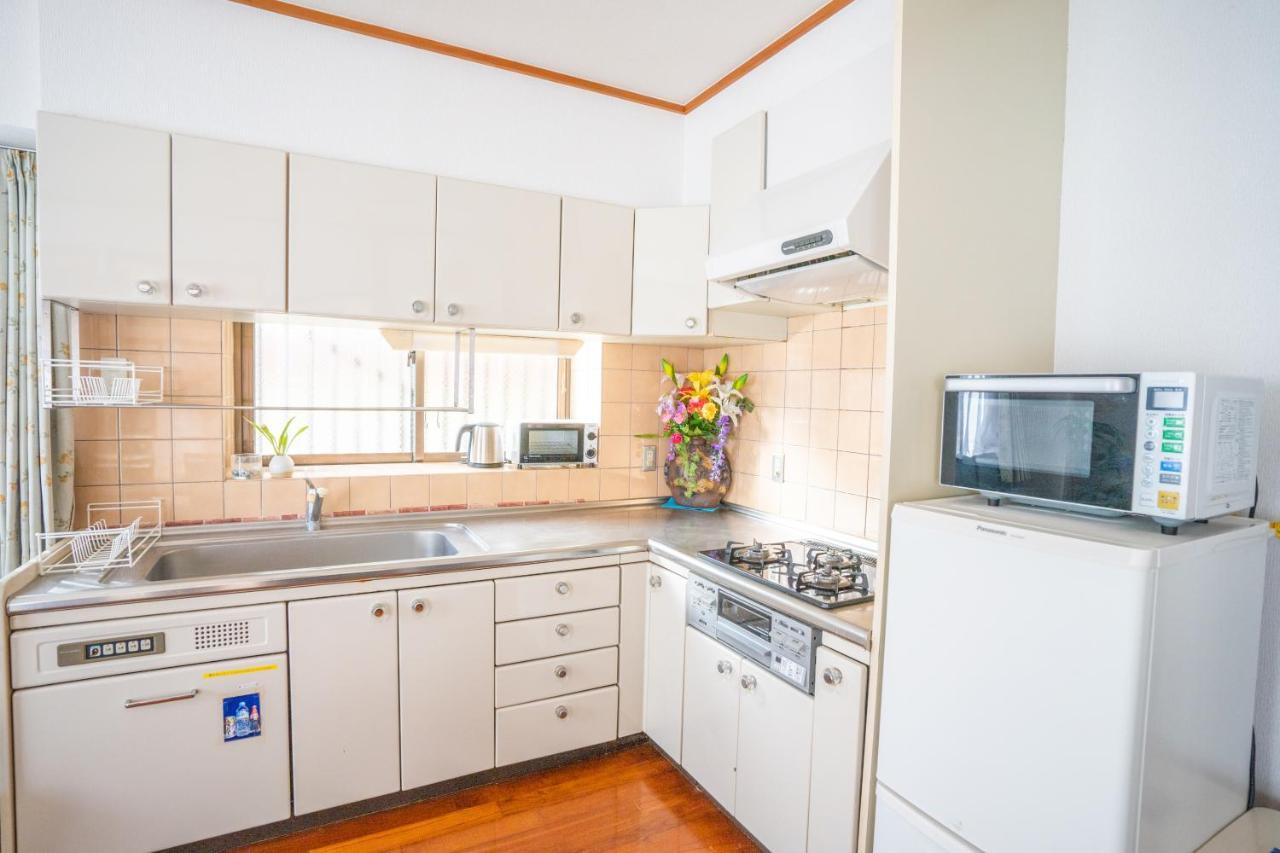 スマイルハイツ Apartamento Naha Exterior foto