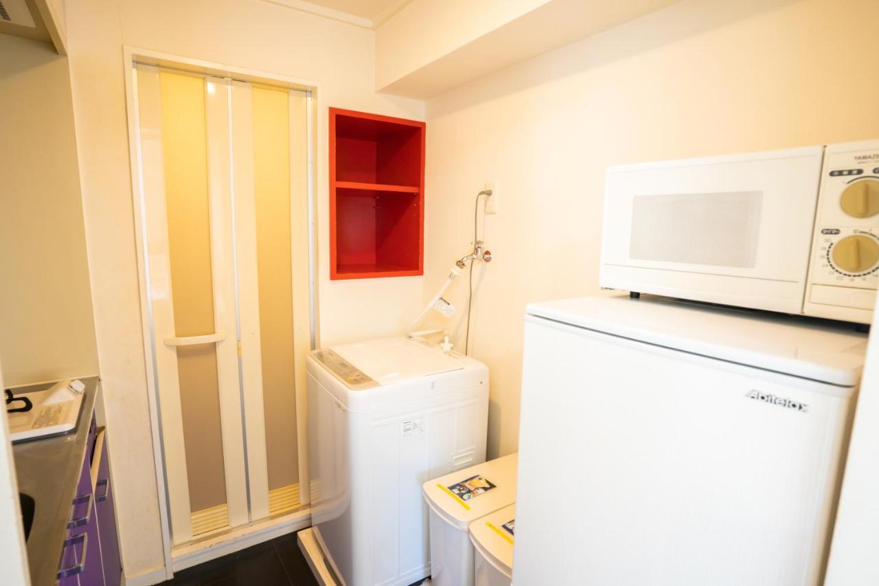 スマイルハイツ Apartamento Naha Exterior foto