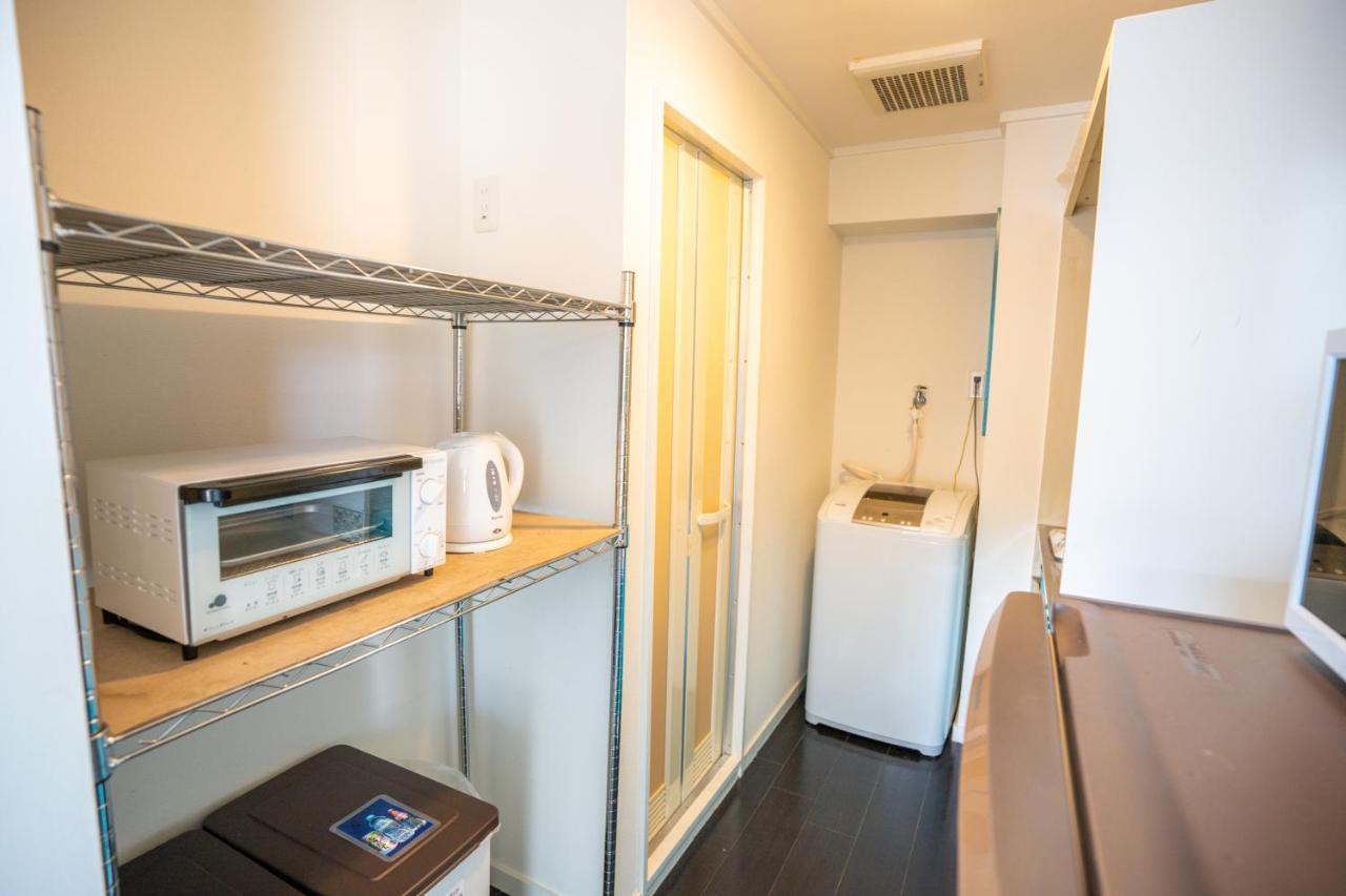 スマイルハイツ Apartamento Naha Exterior foto