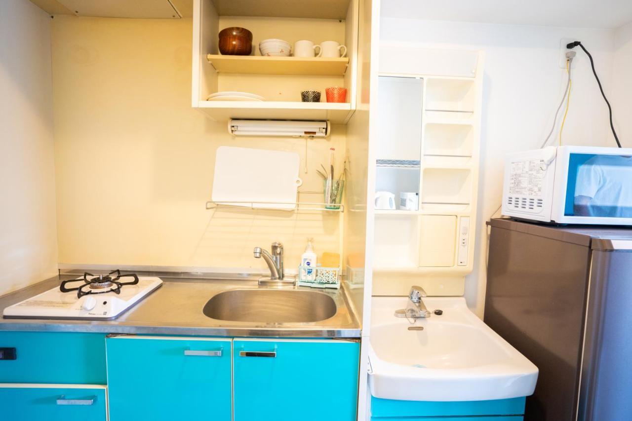 スマイルハイツ Apartamento Naha Exterior foto