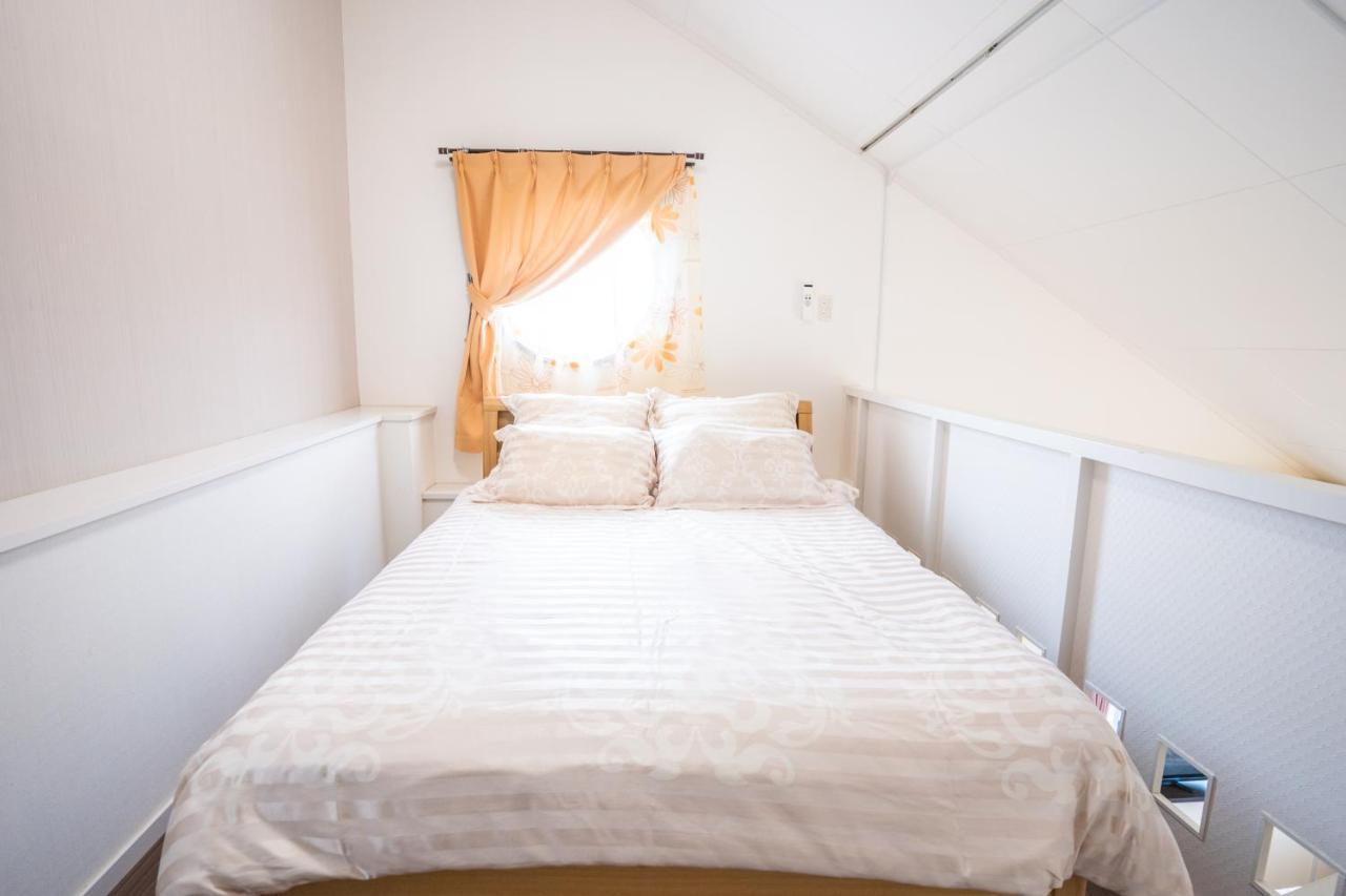 スマイルハイツ Apartamento Naha Exterior foto