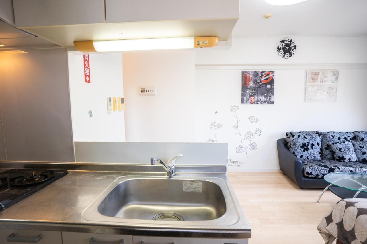 スマイルハイツ Apartamento Naha Exterior foto