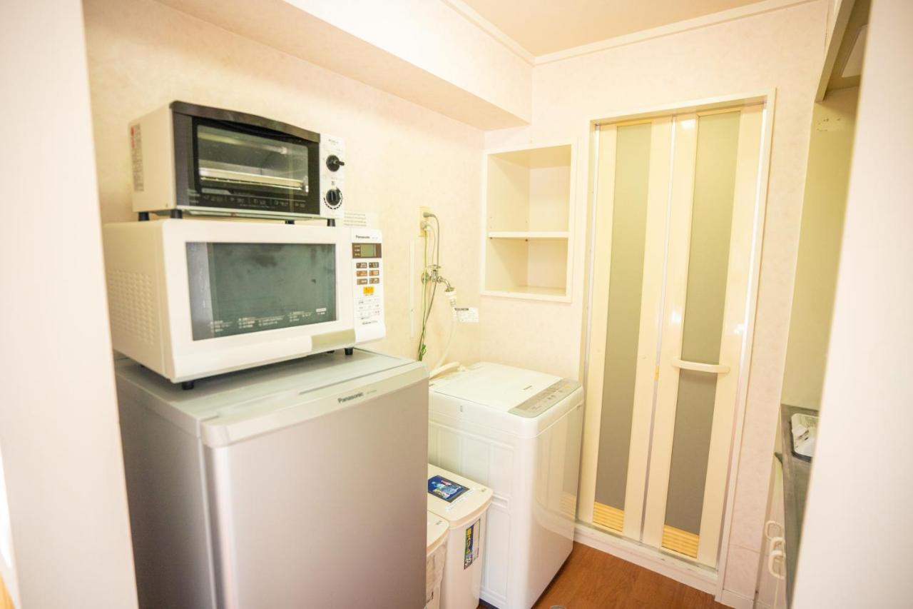 スマイルハイツ Apartamento Naha Exterior foto